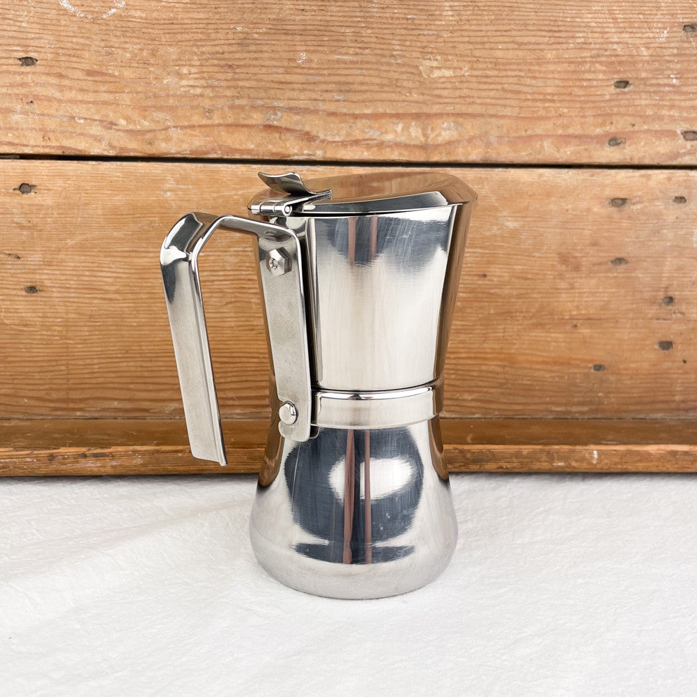 Cafetière italienne avec fermeture par rotation de la poignée