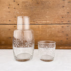 Carafe et verre ciselé