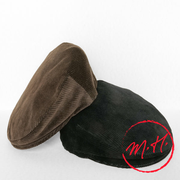 Corduroy flat cap in black, front view