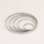 Cercle à tarte perforé en inox De Buyer