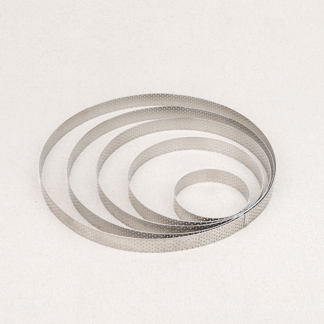 Cercle à tarte perforé en inox De Buyer