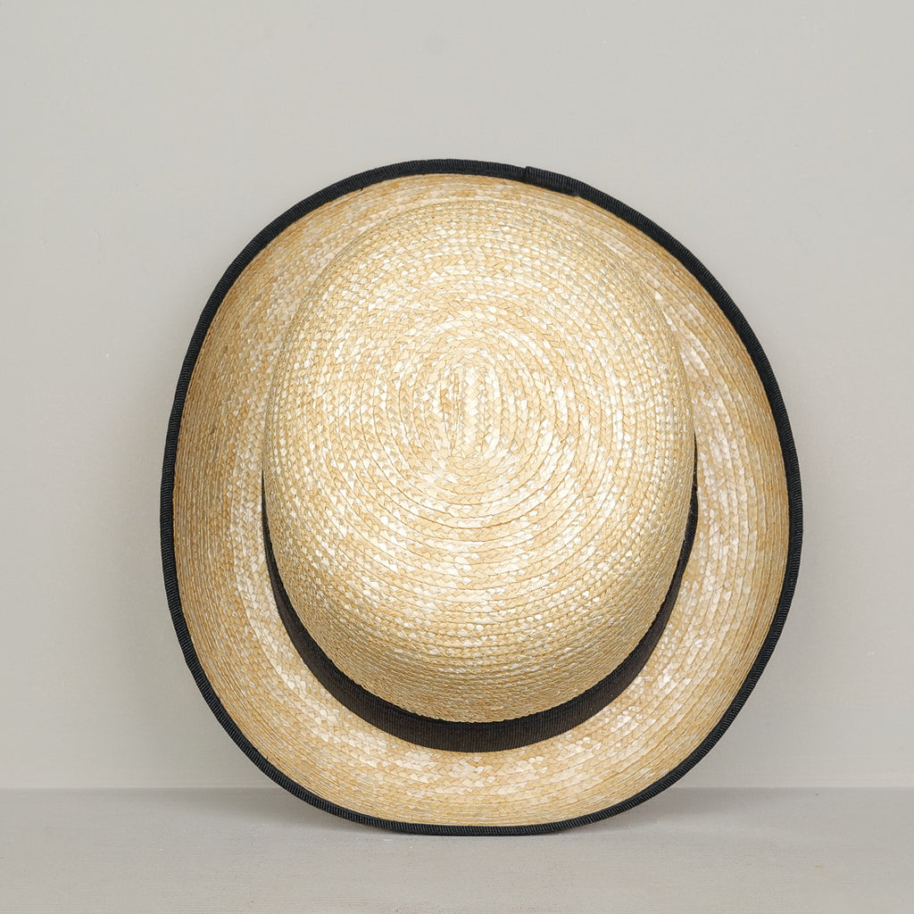 Chapeau melon en paille tressée