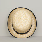 Chapeau melon en paille tressée