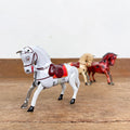 Cheval mécanique blanc