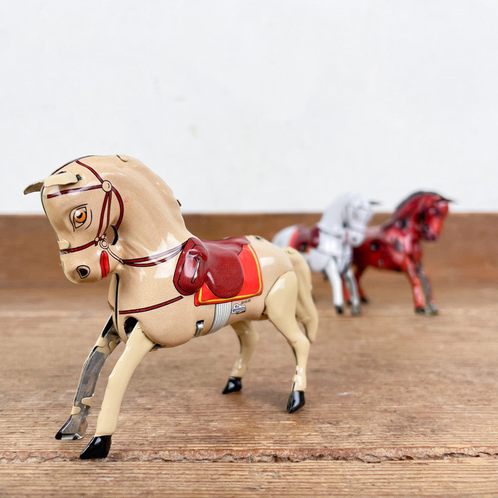 Cheval mécanique beige