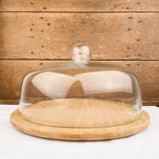 Cloche en verre sur plateau en bambou