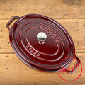 Cocotte ovale en fonte grenat