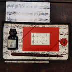 Repose-plume et son encre