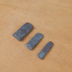 Coin forgé pour manche d'outil