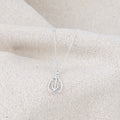 Collier Croix de Camargue argent entourée