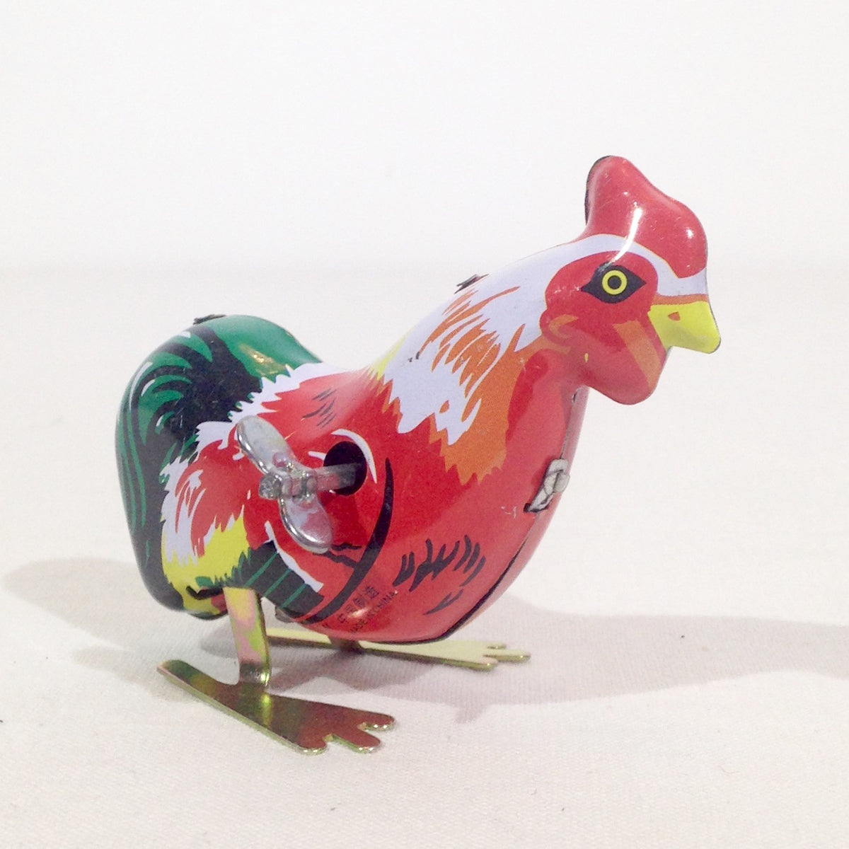 Coq sautillant mécanisme à clé
