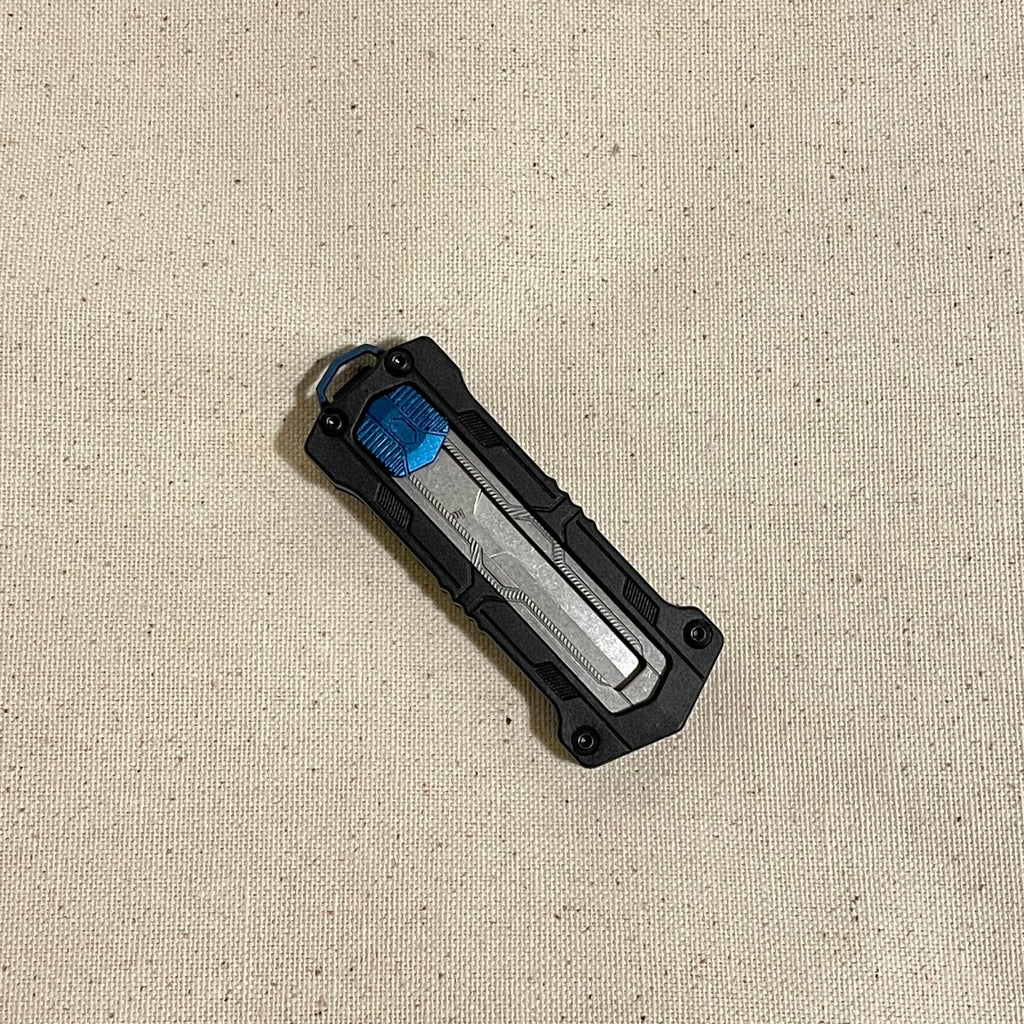 Couteau à glissière Kapsule