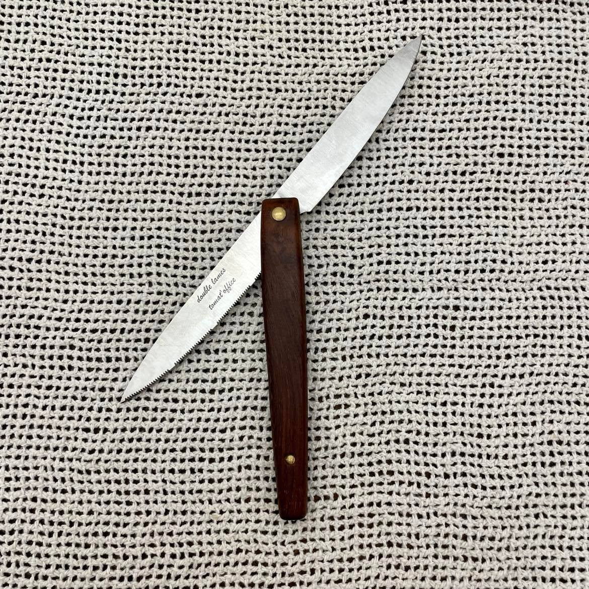 Couteau double lames pivotantes