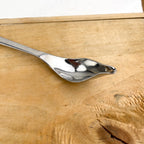 Cuillère plume en inox