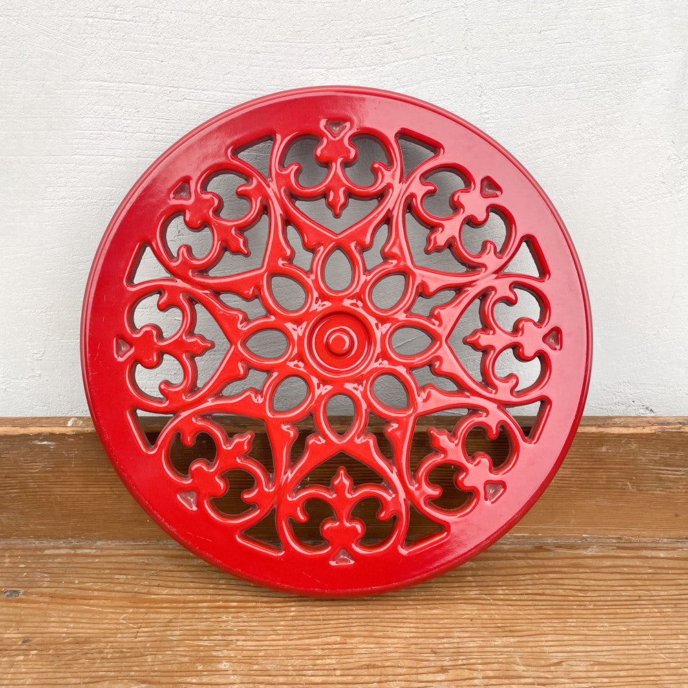 Dessous de plat en fonte rouge