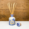 Diffuseur en boîte bleu et or