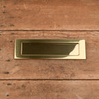 Entrée de boîte aux lettres en laiton avec ressort