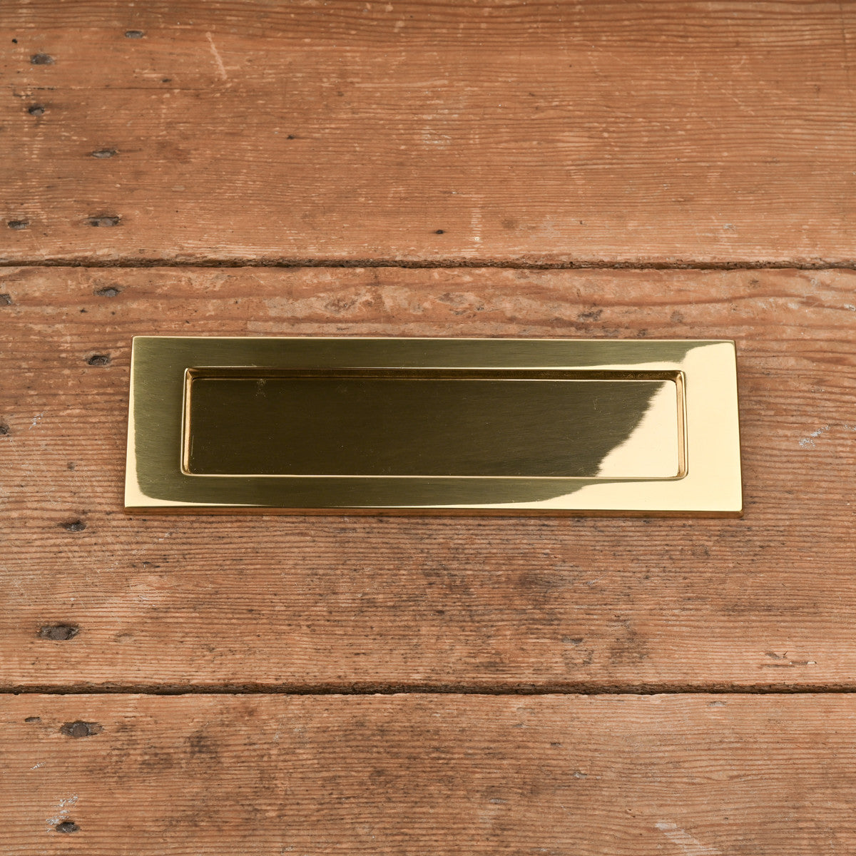 Entrée de boîte aux lettres en laiton avec ressort