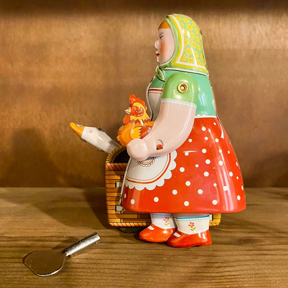 jouet à remontage mecanique fermière oie