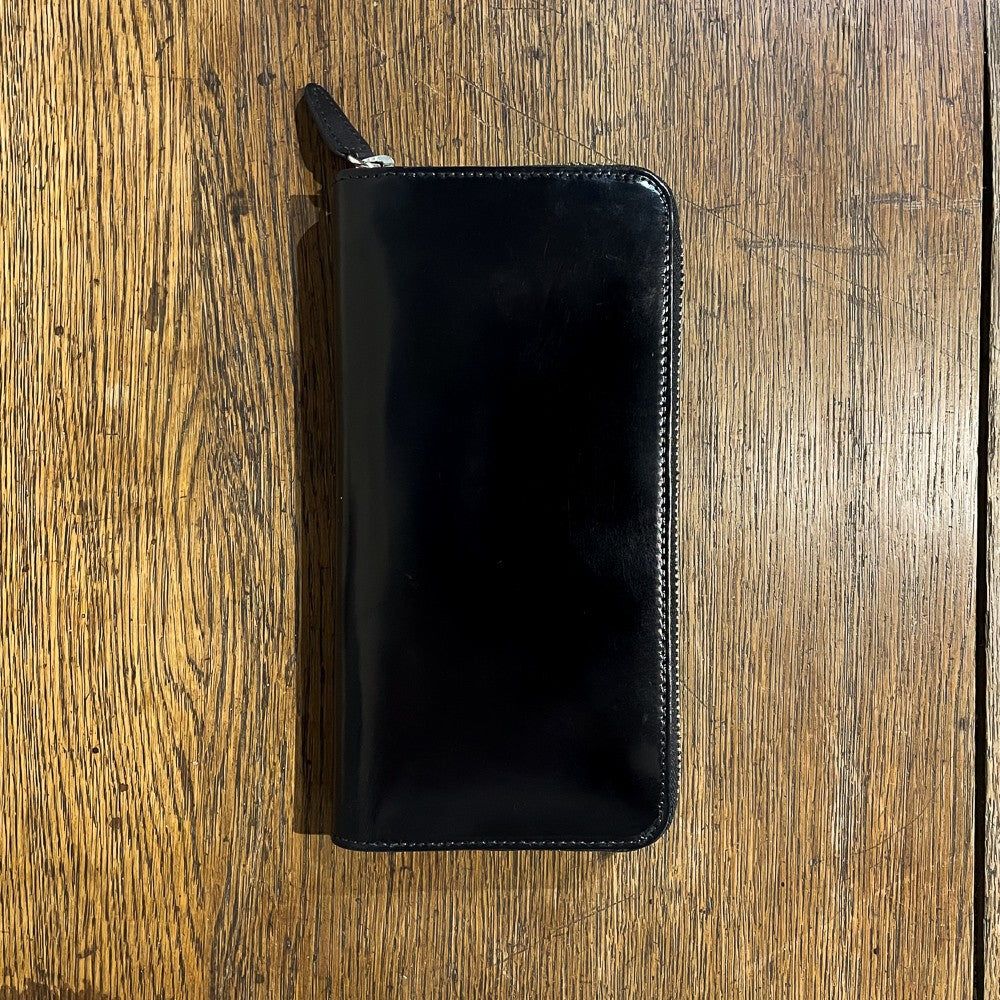 Grand portefeuille zippé en cuir