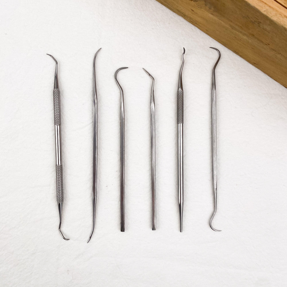 Jeu de 6 grattoirs en inox