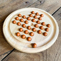 Jeu du solitaire en bois