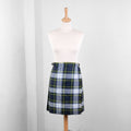 Tartan plaid pattern detail on wool kilt