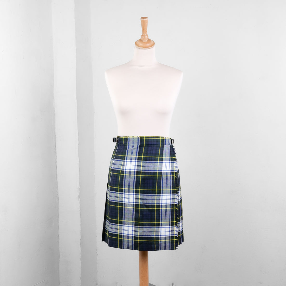 Tartan plaid pattern detail on wool kilt
