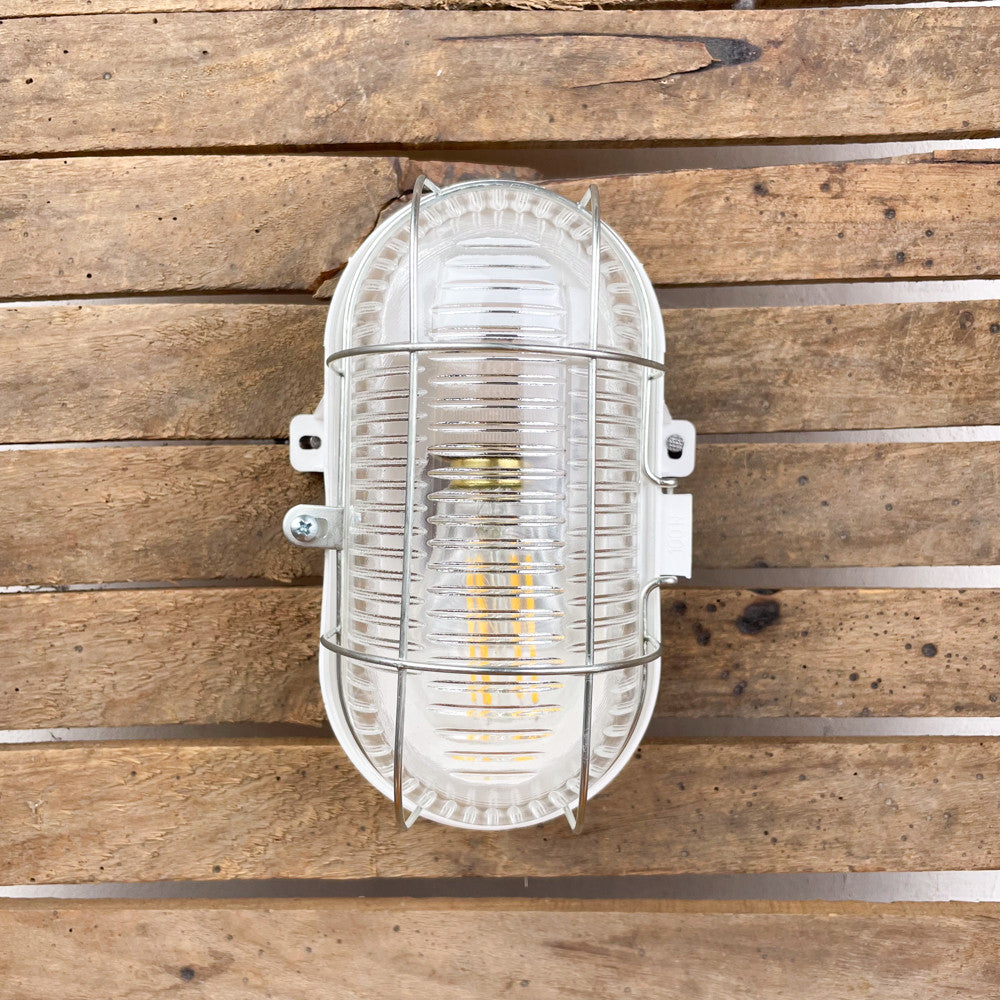 Lampe hublot en bakélite pour salle de bain