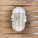 Lampe hublot en bakélite pour salle de bain
