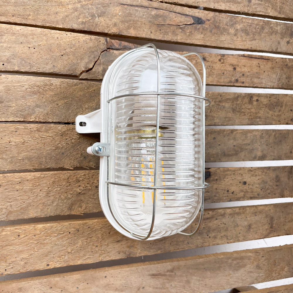 Lampe hublot en bakélite pour salle de bain