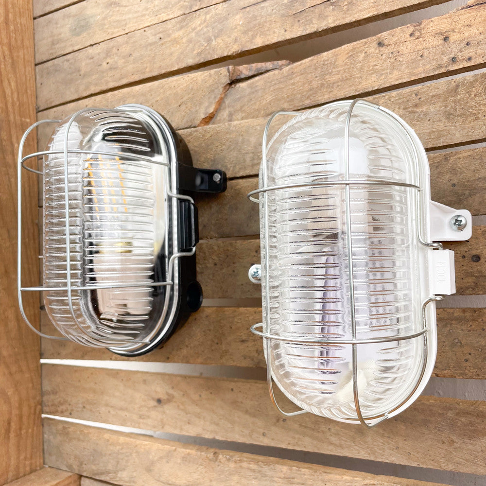 Lampe hublot en bakélite pour salle de bain