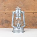 Lampe tempête métal brut