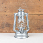 Lampe tempête métal brut