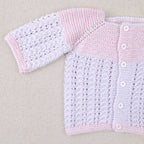 Layette blanche et rose en coton