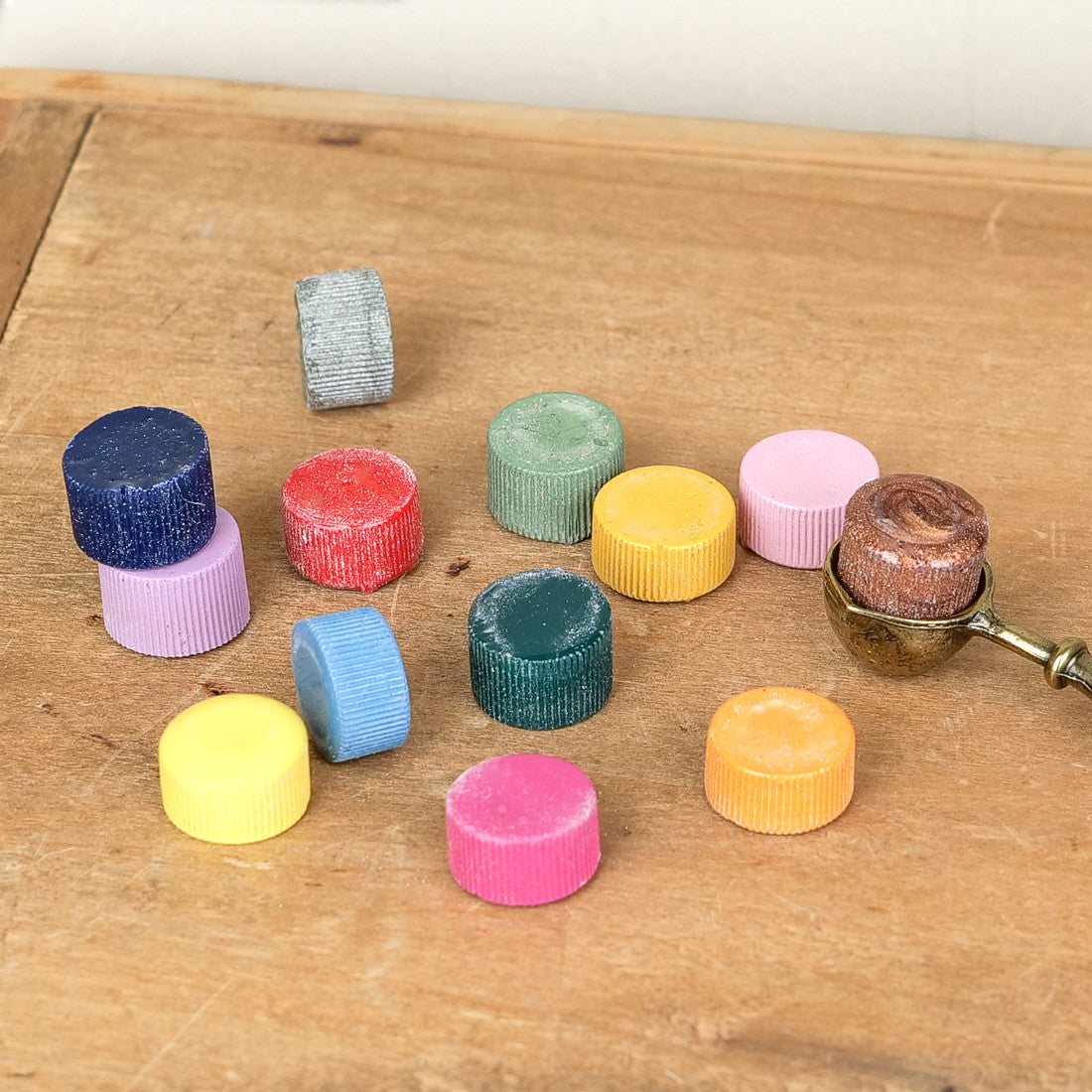 Pastilles de cire colorées