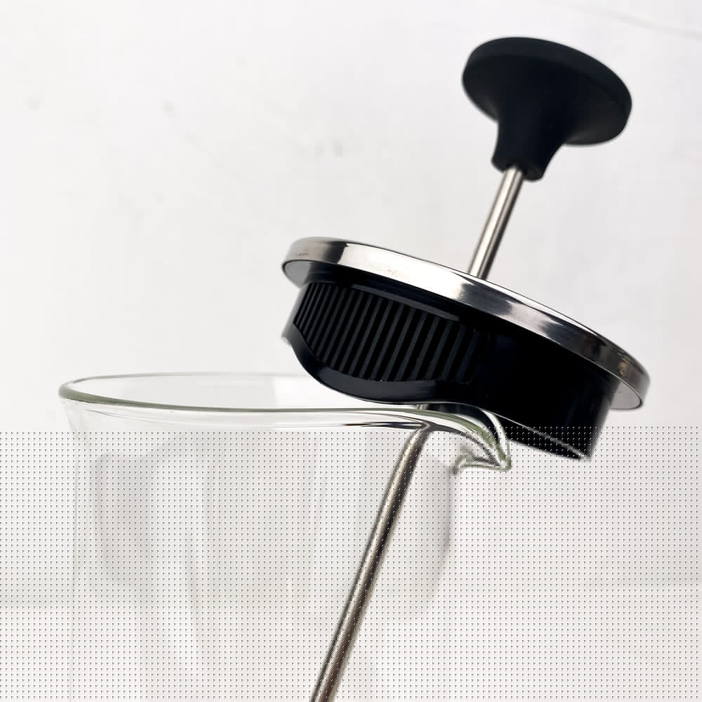 Mousseur à lait à piston