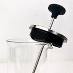 Mousseur à lait à piston