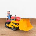 Pelleteuse mécanique rouge et jaune