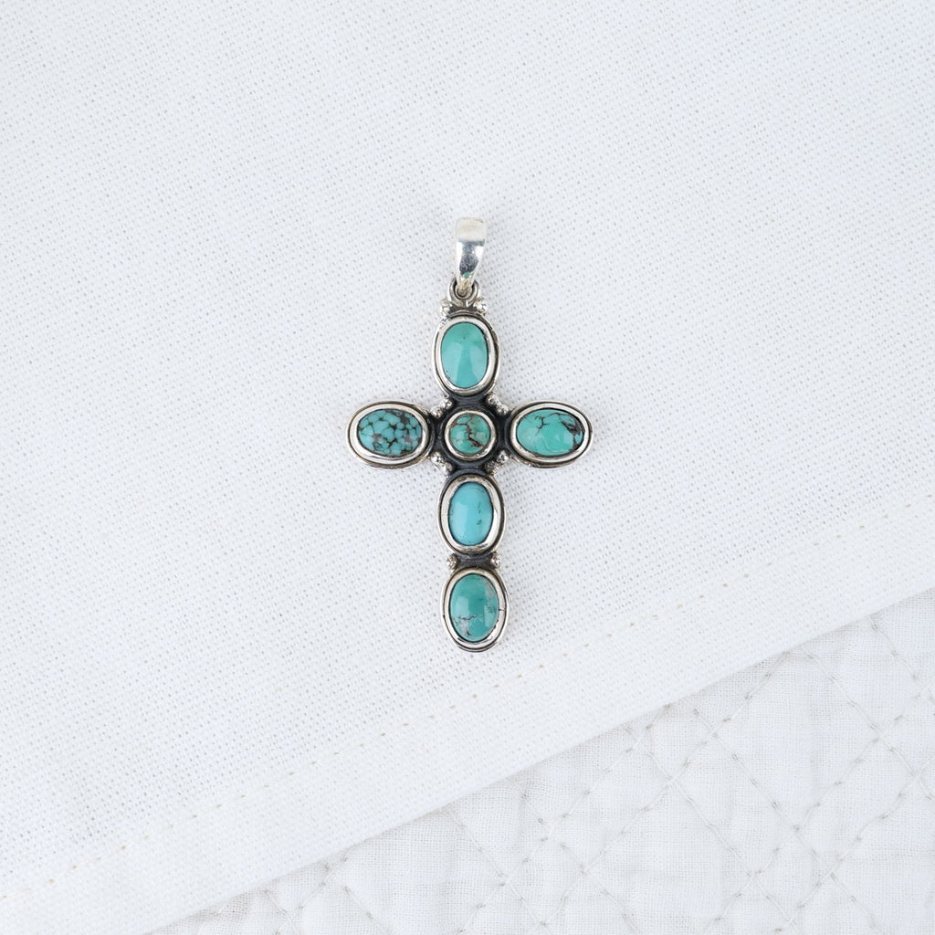 Pendentif croix turquoise sur argent