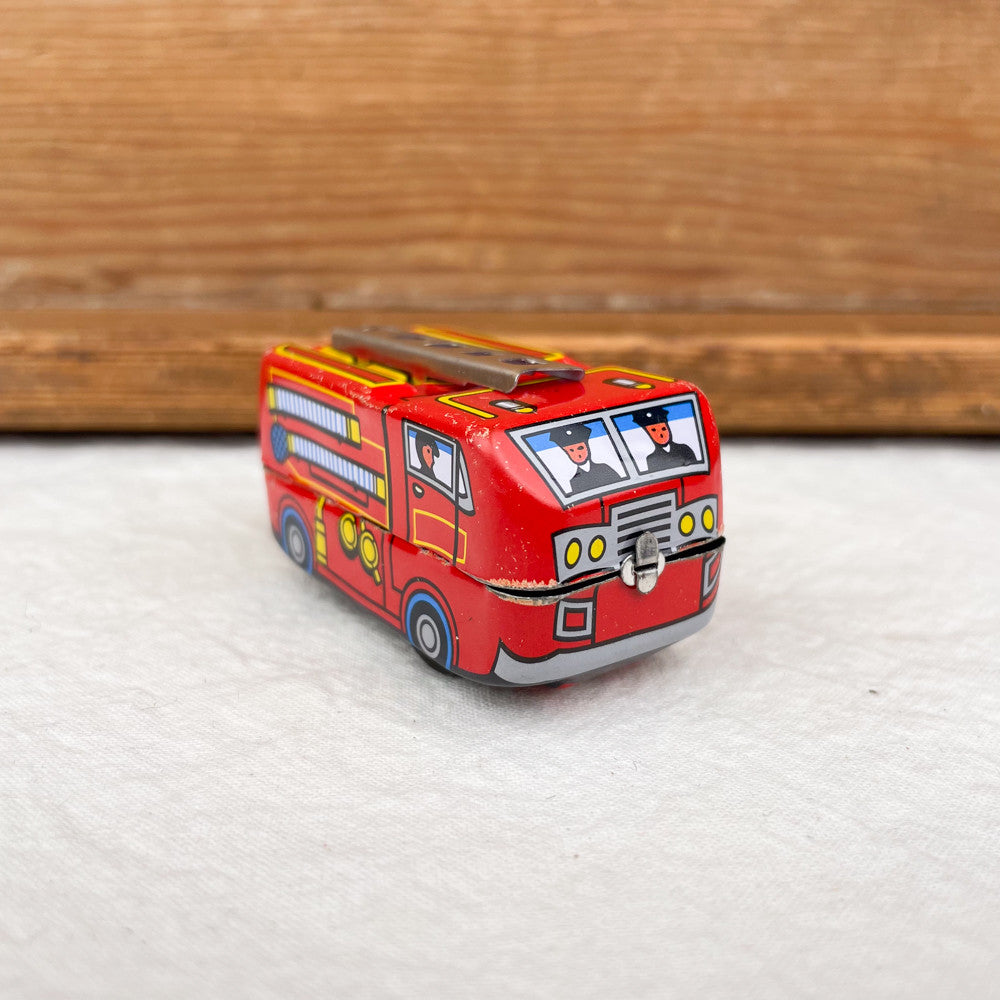 Petit camion de pompiers mécanique