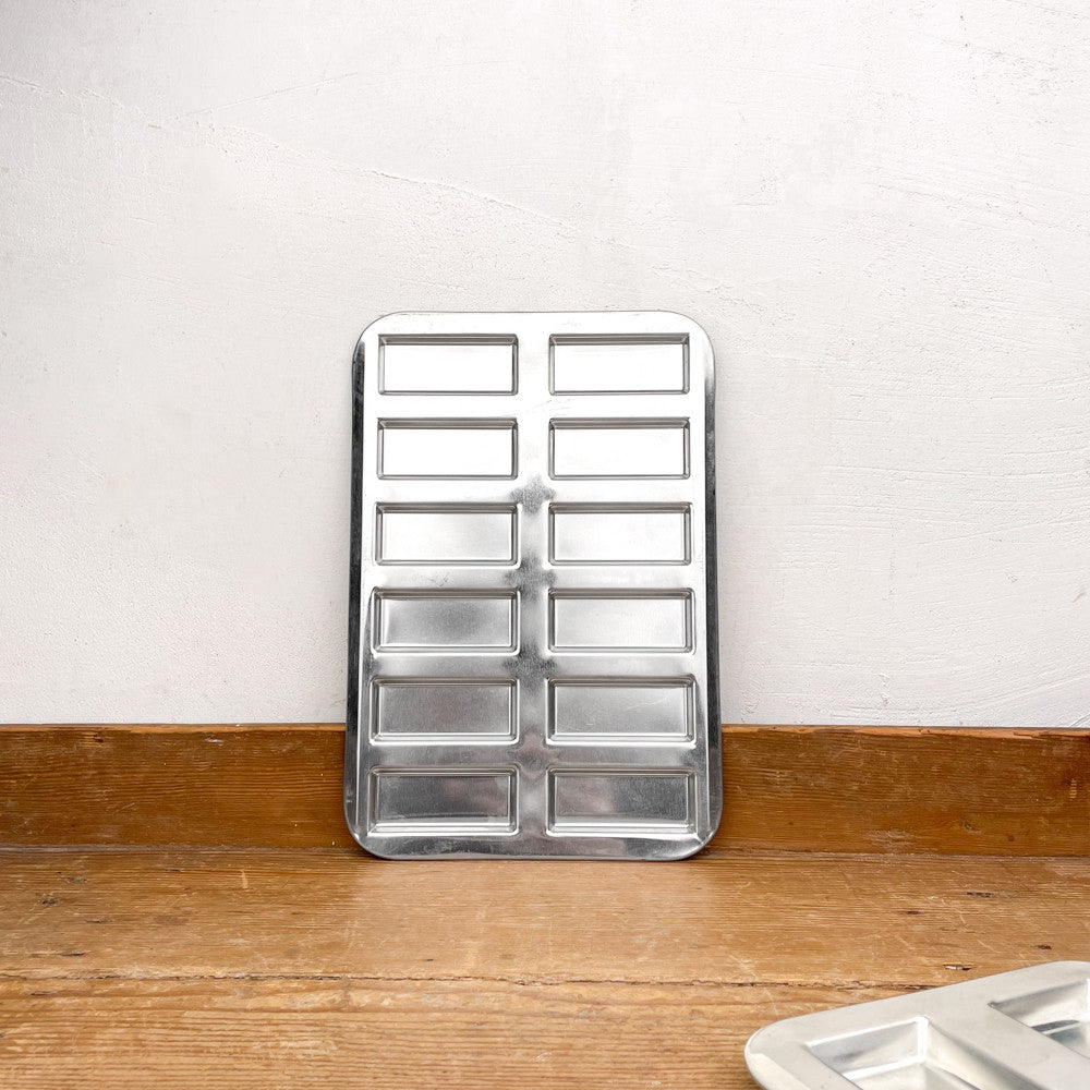 Plaque à financiers x12 en fer blanc Gobel