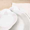 Plat rond à oreilles en porcelaine