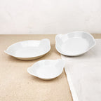 Plat rond à oreilles en porcelaine
