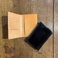Porte passeport en cuir noir