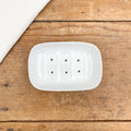 Porte-savon en porcelaine blanche