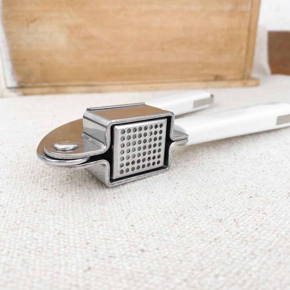 Presse-ail blanc inox