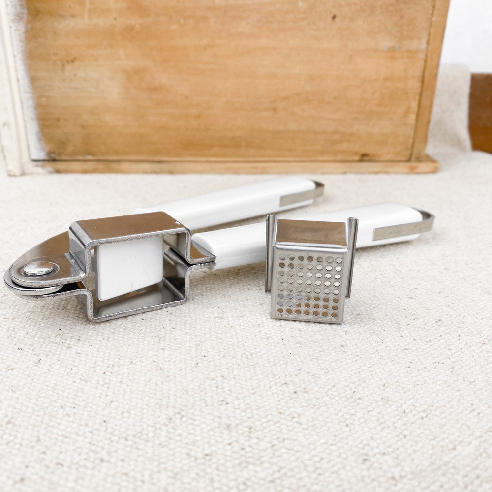 Presse-ail blanc inox