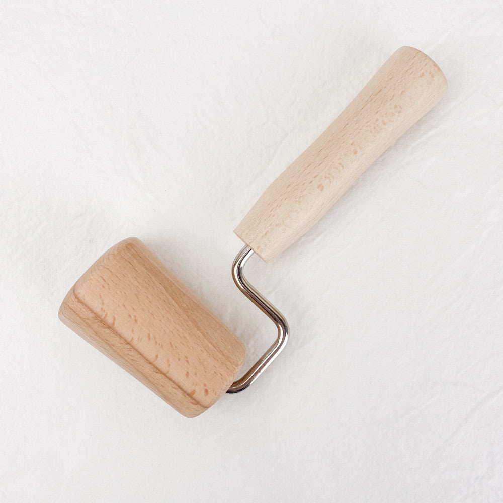 Rouleau conique à étaler la pâte