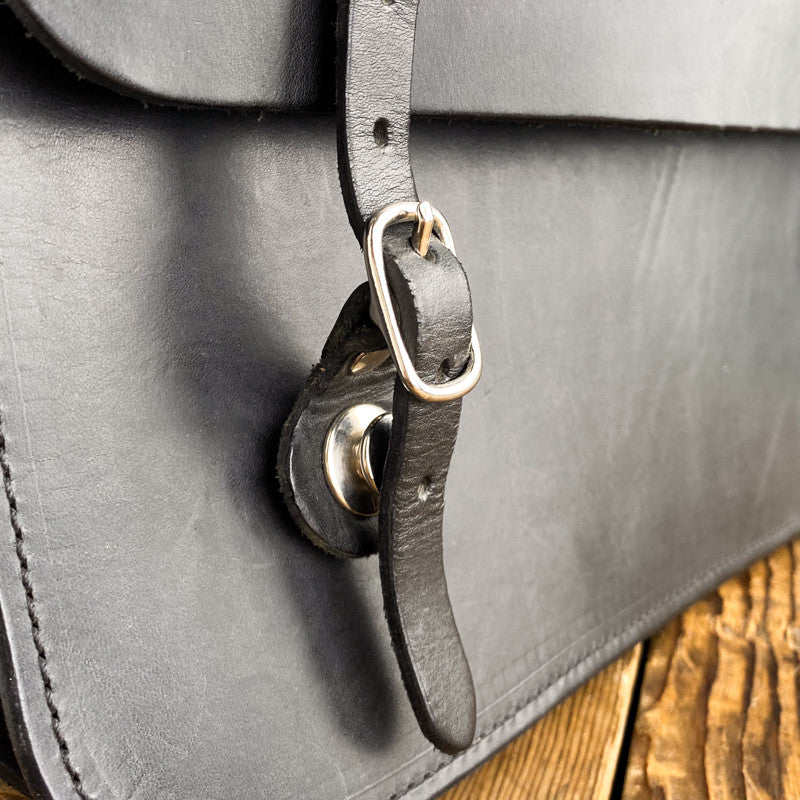 Sacoche cartable double de vélo en cuir noir